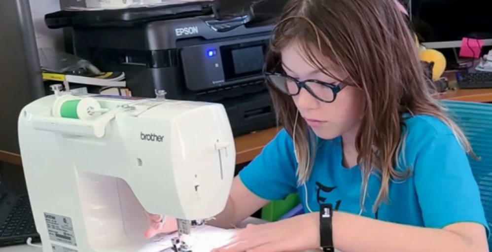 girl sewing